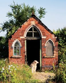 Work is underway to preserve the historic brick summerhouses at the Stoney Road Allotments in Coventry. Credit: Historic England