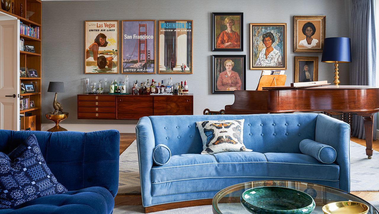 living room with blue sofa