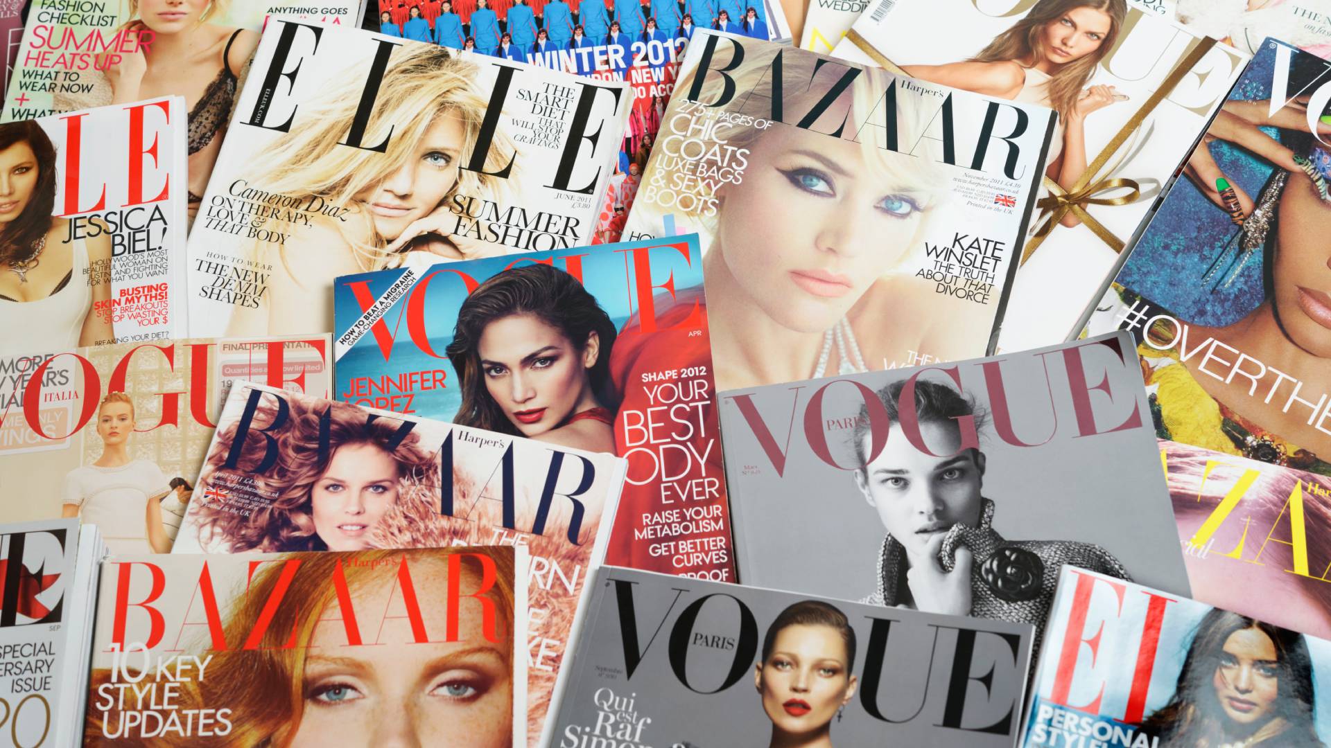 Seoul, Korea - September 9, 2012: Studio product shot of cover images of fashion magazines, VOGUE, ELLE and Harper&#039;s BAZAAR for research and making up a fashion story.
