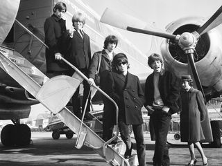 The Rolling Stones on tour in 1965, with "darling" Charlie, upper left