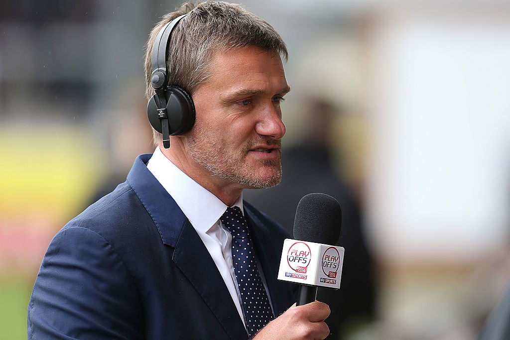 Sky Sports presenter Andy Hinchcliffe looks on prior to the Sky Bet League Two Semi Final First Leg between Burton Albion and Southend United at Pirelli Stadium on May 11, 2014 in Burton-upon-Trent, England.