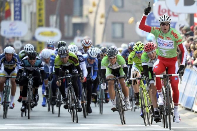 Alexander Kristoff (Katusha) celebrates as he crosses the finish line in De Panne
