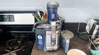 Oster Self-Cleaning Professional Juice Extractor on kitchen counter