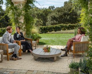 meghan markle and prince harry interviewed by oprah in her garden seated at walmart outdoor chairs