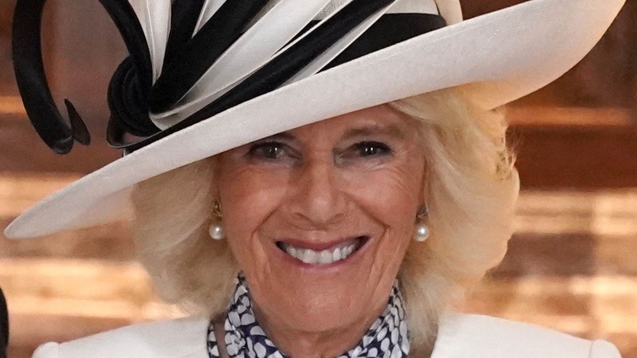 Queen Camilla ‘really stepped it up’ with Garden Party outfit in Scotland, according to fans. Seen here Queen Camilla receives a coronation bouquet