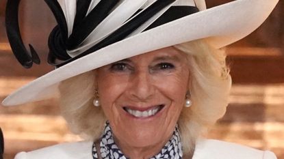 Queen Camilla ‘really stepped it up’ with Garden Party outfit in Scotland, according to fans. Seen here Queen Camilla receives a coronation bouquet