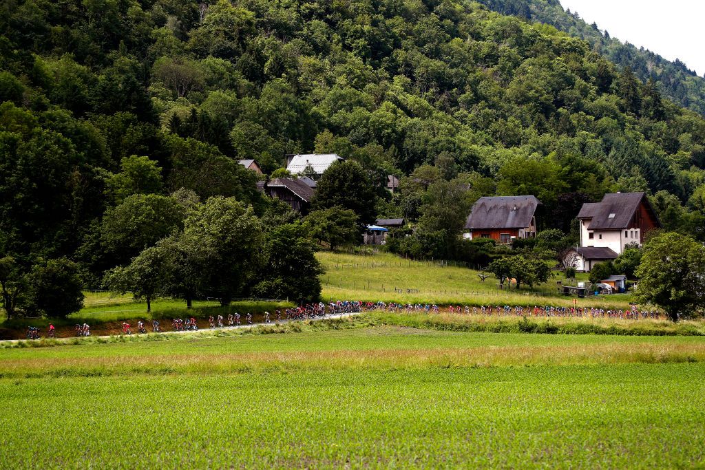 LA PLAGNE FRANCE JUNE 05 The peloton passing through a landscape during the 73rd Critrium du Dauphin 2021 Stage 7 a 1715km stage from SaintMartinLeVinoux to La Plagne 2072m UCIworldtour Dauphin dauphine on June 05 2021 in La Plagne France Photo by Bas CzerwinskiGetty Images