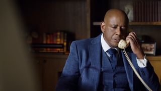 Forest Whitaker as Bumpy Johnson on the phone in Godfather of Harlem
