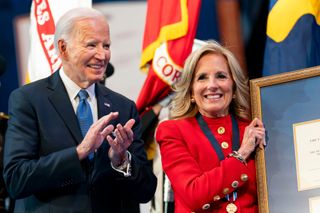 Jill Biden and Joe Biden onstage at an event