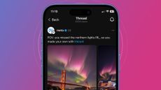 A phone on a purple and pink background showing a Meta post on Threads about AI images of the northern lights