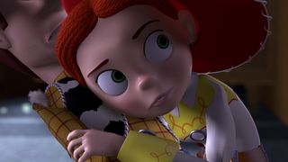 Jessie listens to Woody's voice box in Toy Story 2