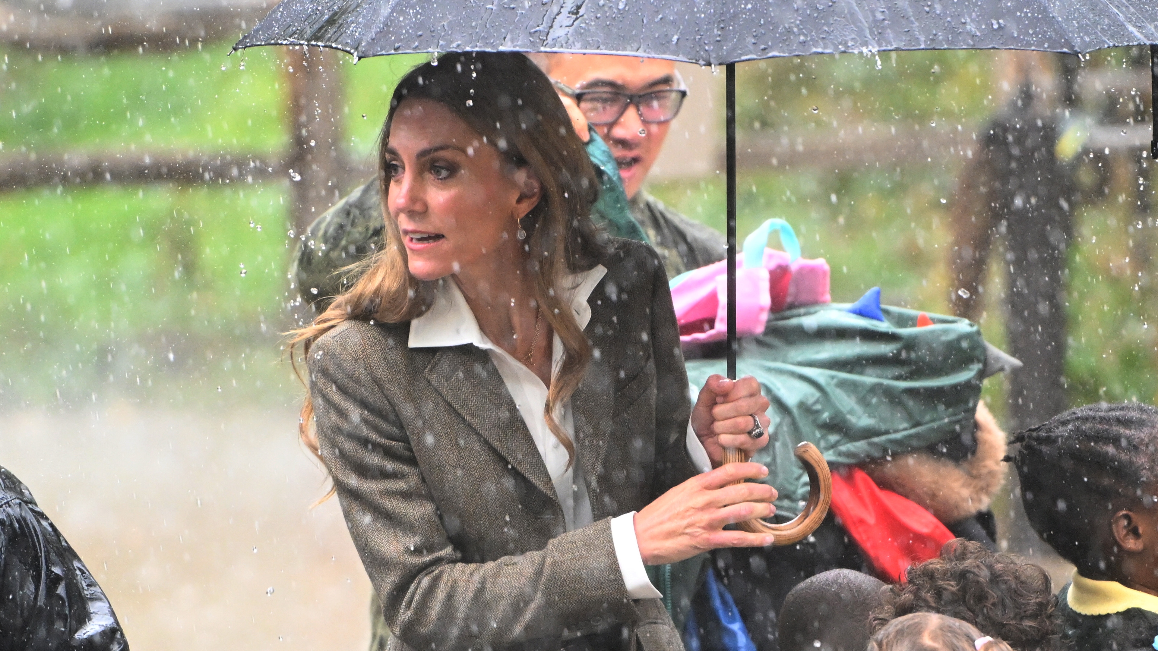 Kate Middleton holds an umbrella during her visit to the Natural History Museum in 2025