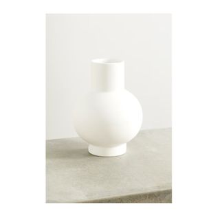 white rounded ceramic vase