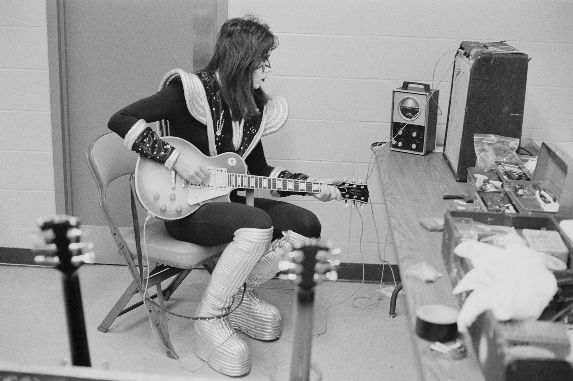 Guitarist Ace Frehley of American heavy metal group Kiss, practising backstage during the band&#039;s Rock &amp;amp; Roll Over tour, New York, February 1977.
