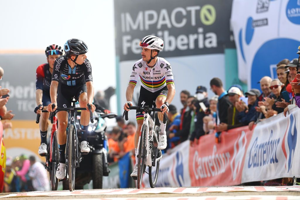 COLLU FANCUAYA SPAIN AUGUST 27 LR Marco Brenner of Germany and Team DSM and Julian Alaphilippe of France and Team QuickStep Alpha Vinyl cross the finishing line during the 77th Tour of Spain 2022 Stage 8 a 1534km stage from Pola de Laviana to Collu Fancuaya 1084m LaVuelta22 WorldTour on August 27 2022 in Collu Fancuaya Spain Photo by Tim de WaeleGetty Images