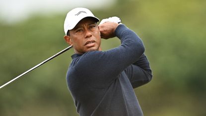 Tiger Woods takes a shot during The Open