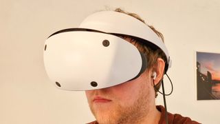 The PlayStation VR 2 on our reviewer, Roland Moore-Colyer