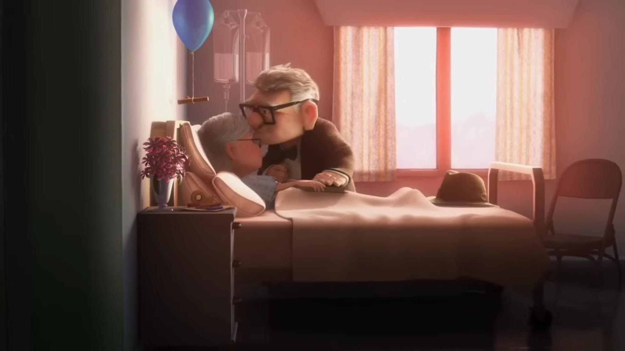 Carl giving his sick wife a kiss on the head in Up