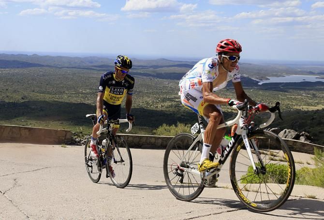 Stage three winner Alex Diniz (Funvic Brasilinvest) leads Alberto Contador on the Cerro el Amago climb.