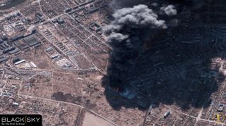 This BlackSky satellite image, collected over Chernihiv, Ukraine, on Feb. 28, 2022 at 12:22 local time (UTC+2), shows an Epicentr K home improvement warehouse ablaze with scorched fields a few hundred meters east following shelling in the area.