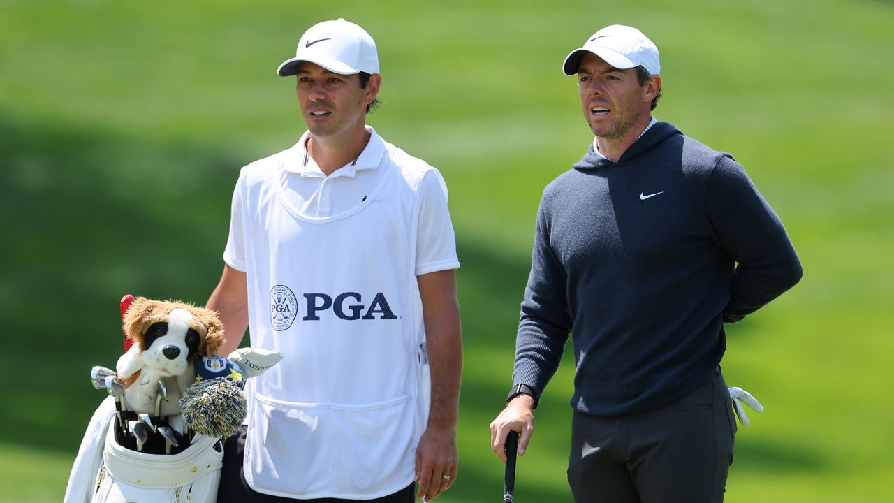 Rory McIlroy and Harry Diamond during the first round of the 2023 PGA Championship