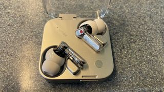 Nothing Ear (3) being tested on a commuter train late at night