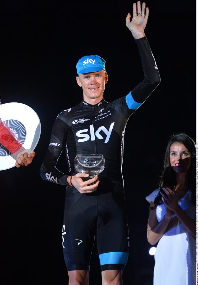 Chris Froome (Team Sky) waves from the podium