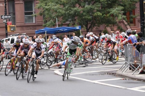The men's pack explodes off the start line-and the crashes start on the first turn.