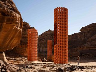 Desert X AlUla 2024 installations, towers of terracotta pots in the landscape