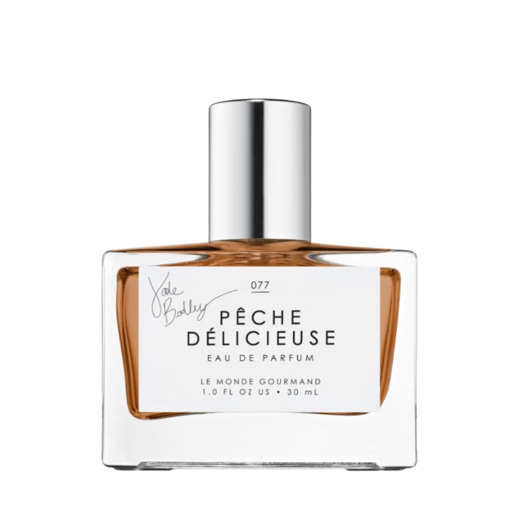 A product shot of the Le Monde Gourmand Peche Delicieuse Eau de Parfum, on a white background