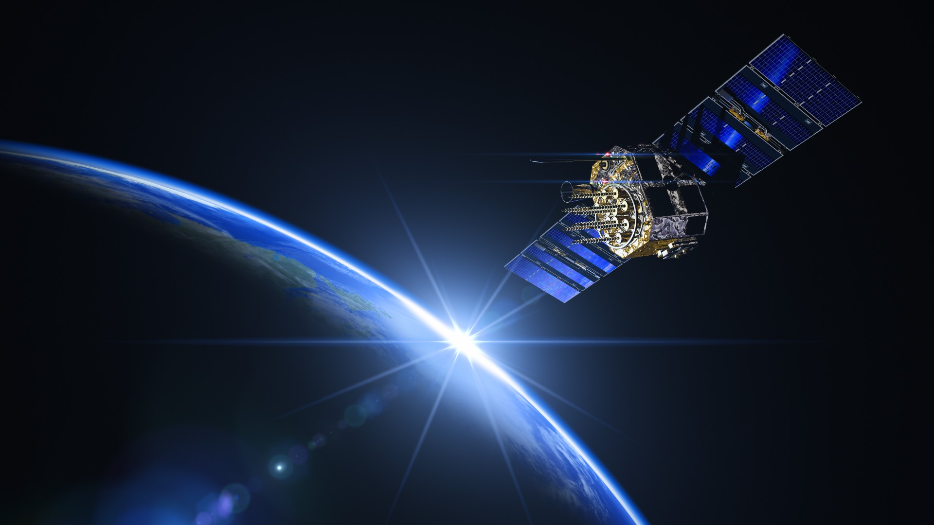 Satellite and sunrise in space. BlackJack3D via Getty Images.