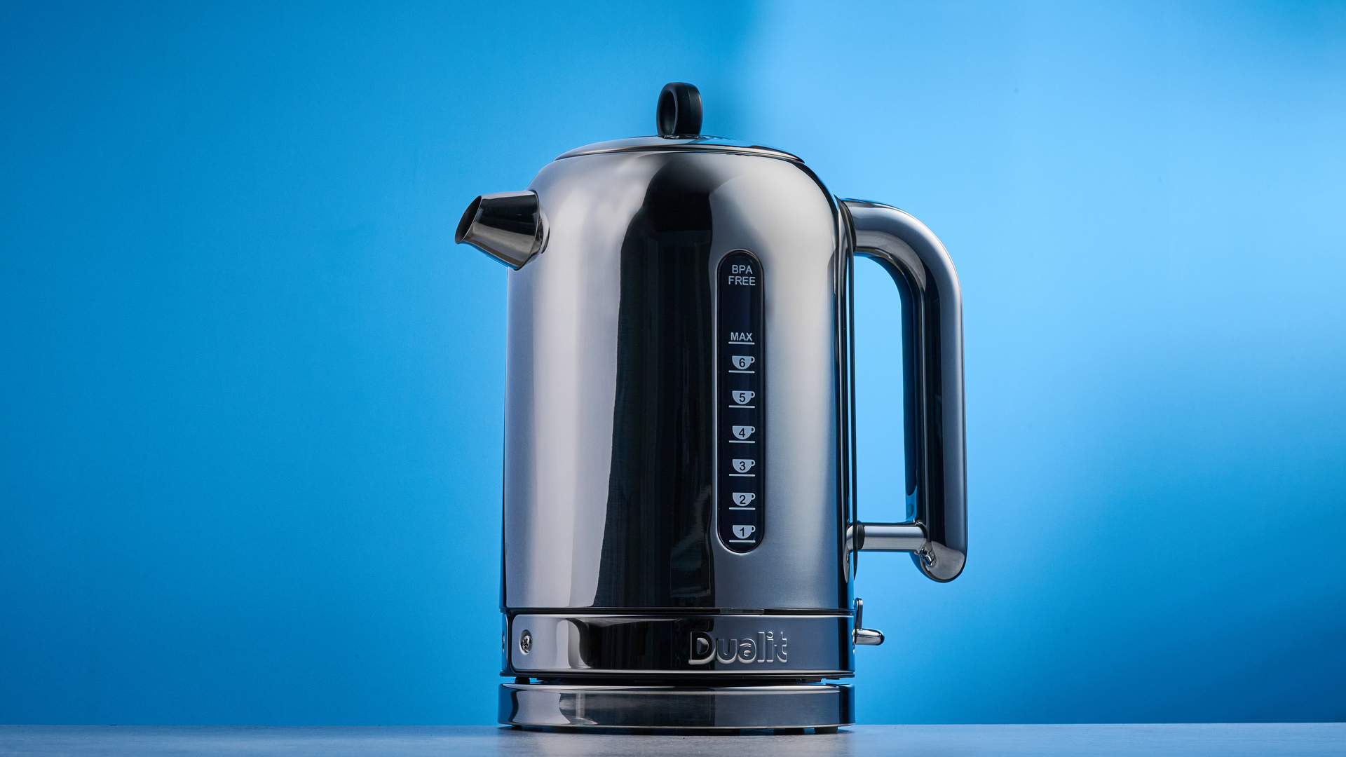 Dualit Classic Kettle photographed in front of a blue background