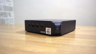 A closeup of the Asus Chromebox 4 showing the power button