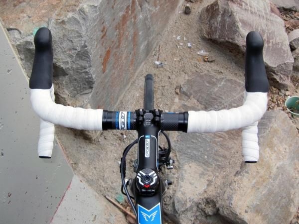 The bar tops sweep forward in an effort to provide a more natural grip angle for your wrists but the bars feel narrower than they are and are too large in diameter up top