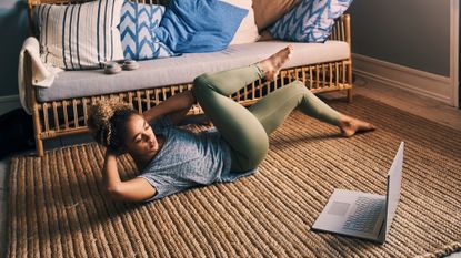 Woman doing an ab workout at home