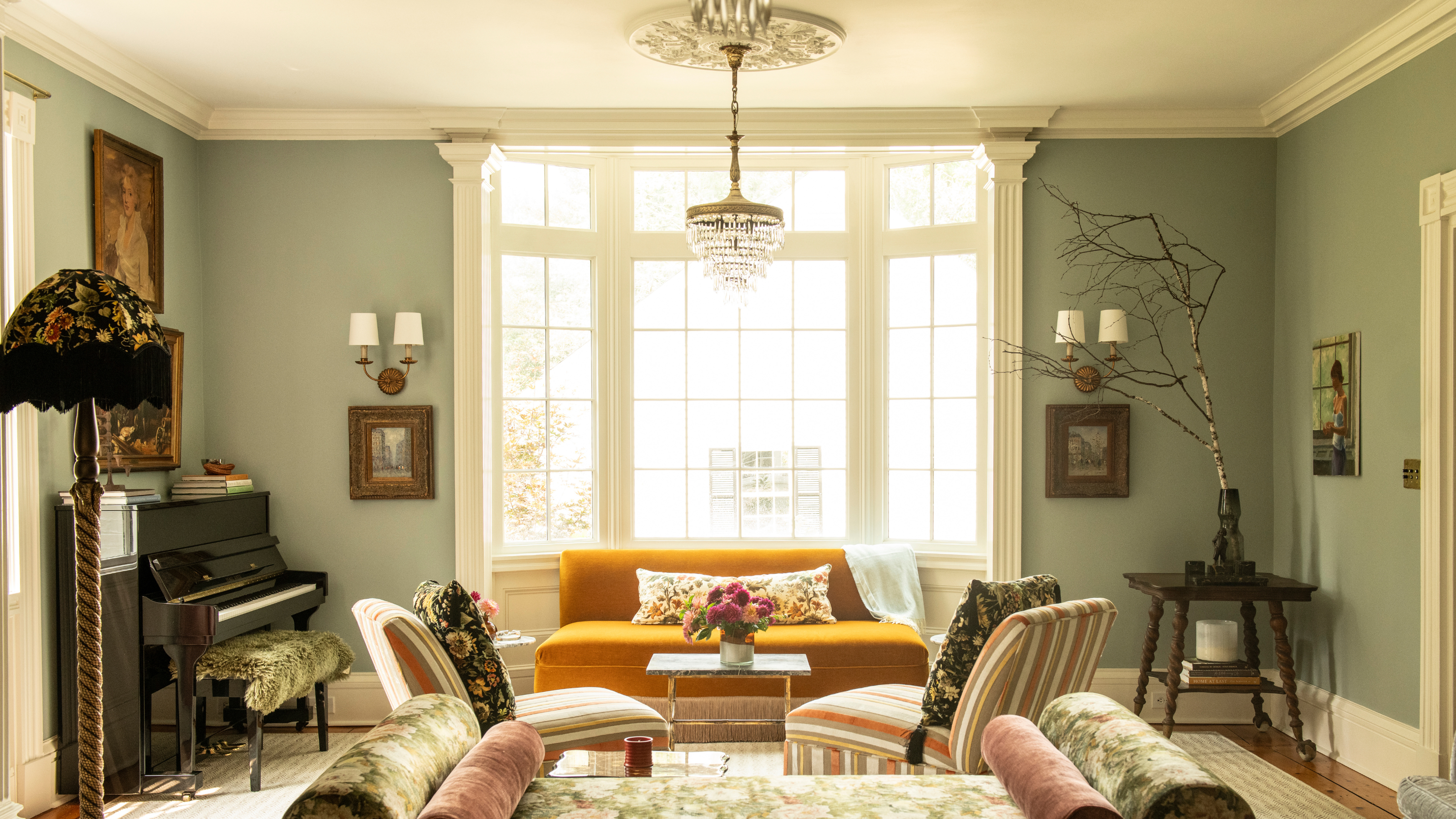 Green living room by Nicole Fisher, decorated with antique furniture and collected objects