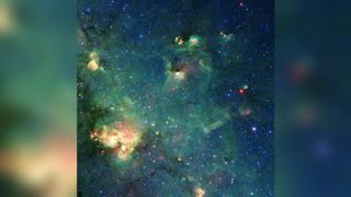Pareidolia tricked NASA into seeing Godzilla in this Spitzer Space Telescope image of a cloud of dust and gas.