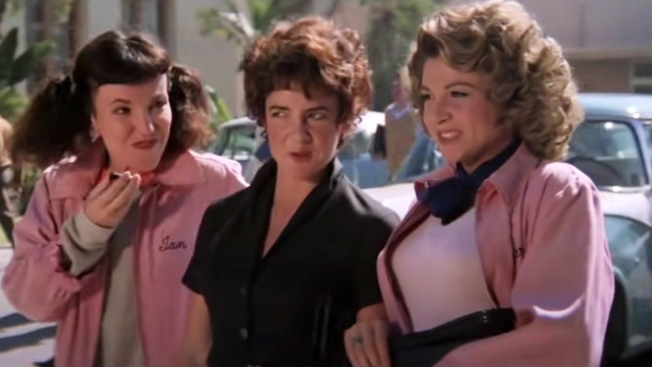 The Pink Ladies, featuring Rizzo in the middle, in Greese