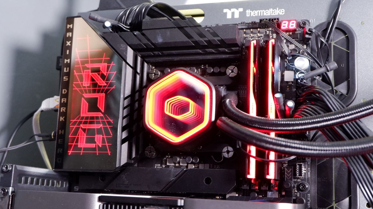 A Cooler Master MasterLiquid 360 Core II liquid cooler set-up on a test bench.
