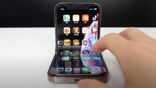 A video screen grab of a folding iPhone made by a fan