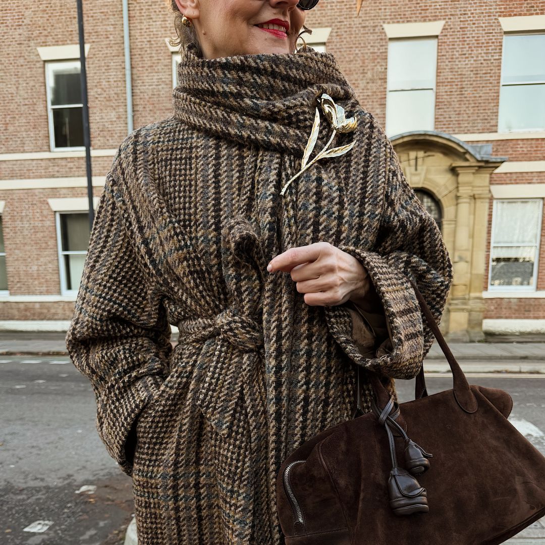 Renia Jazdzyk wearing a scarf coat