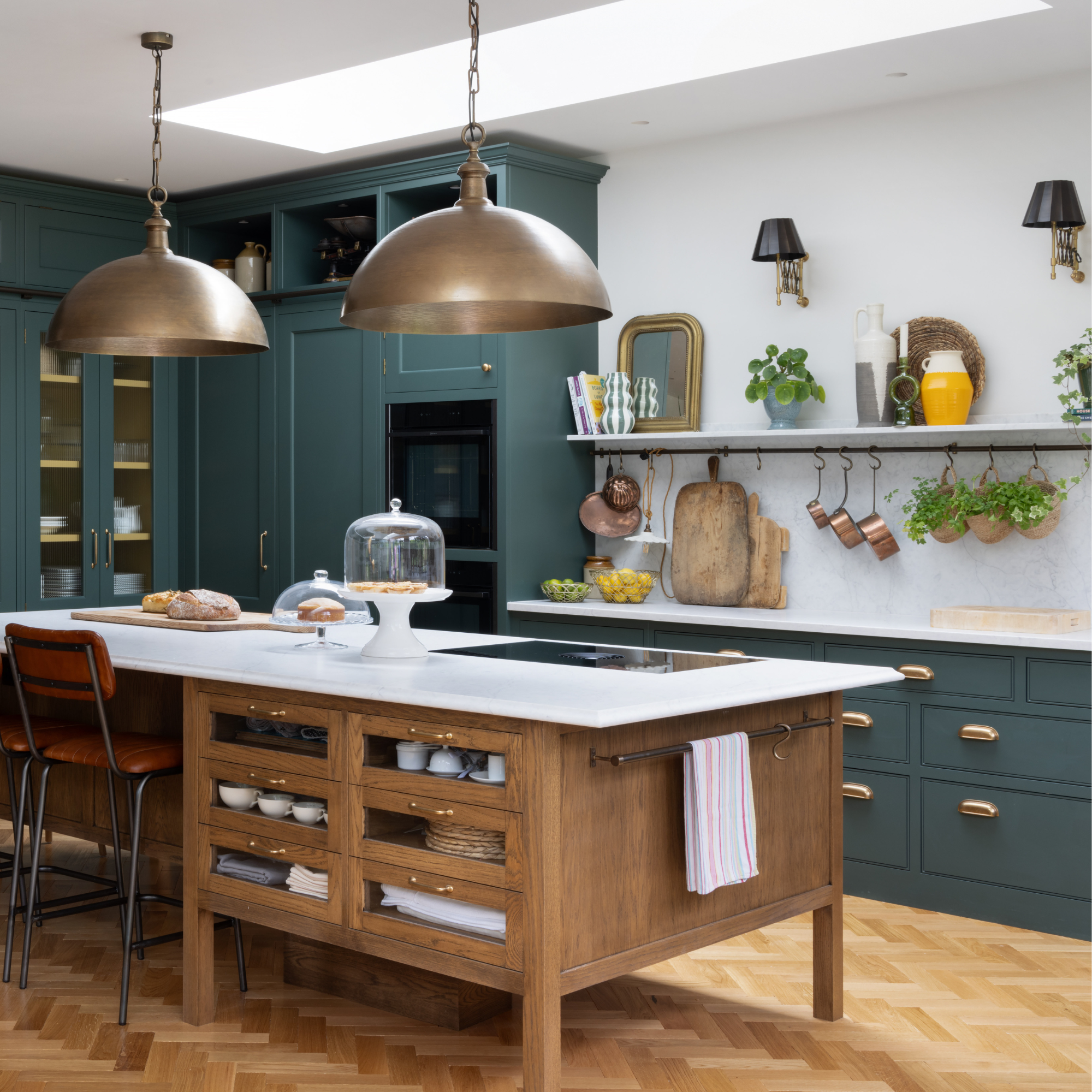 a painted victorian kitchen with bronze ceiling lights