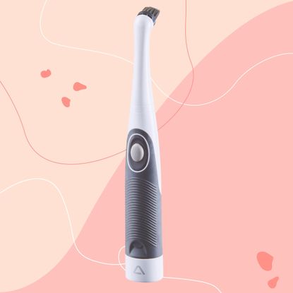 Aldi electric cleaning brush against pink background