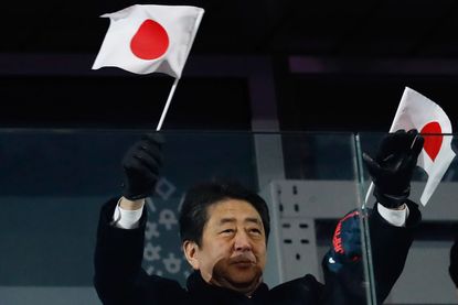 Shinzo Abe cheers Japan at the Winter Olympics in South Korea