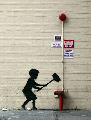 Classic Banksy as he showcases the power of the quick stencil