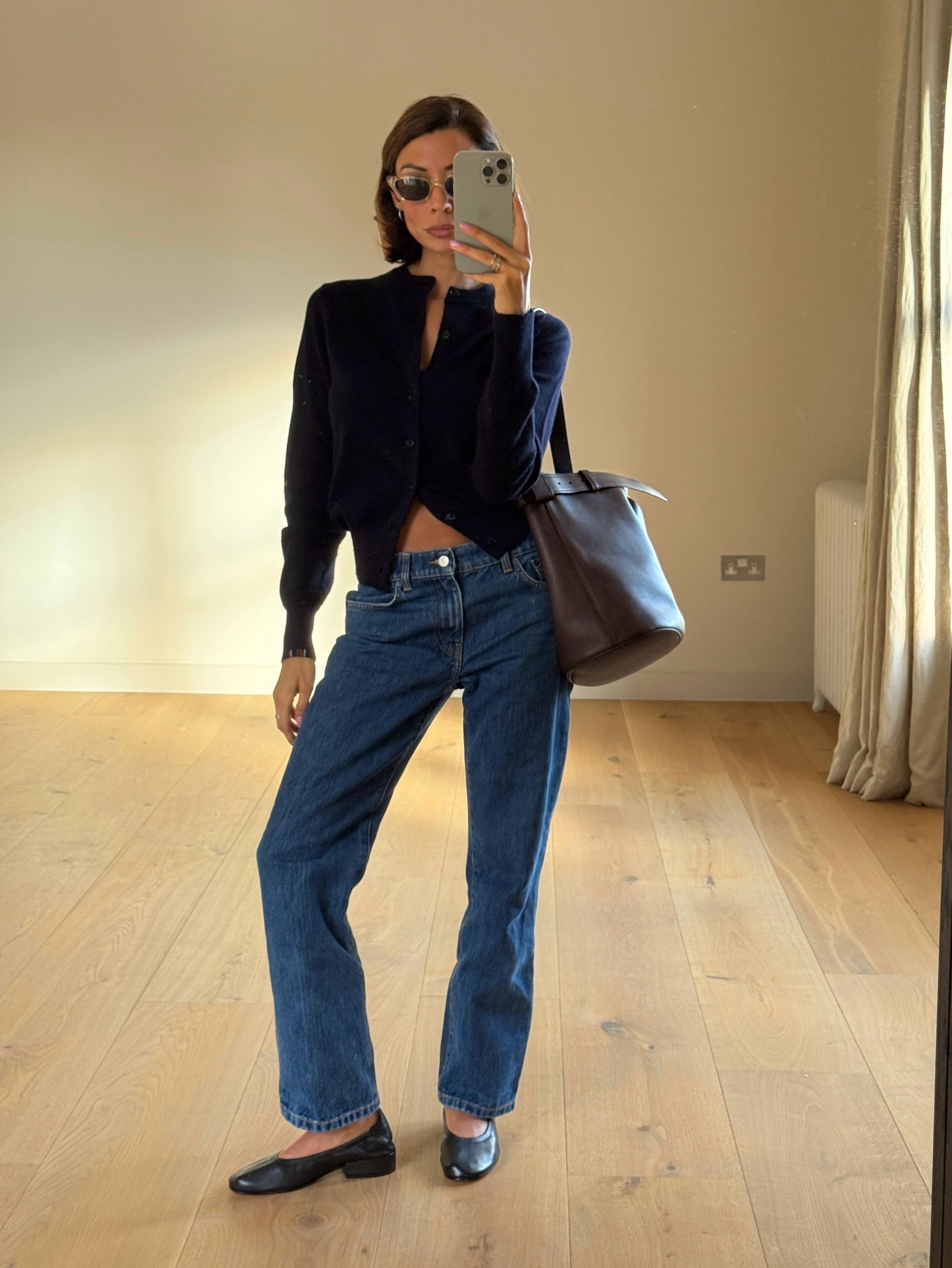An image of a woman wearing put together fall outfit formula 2026