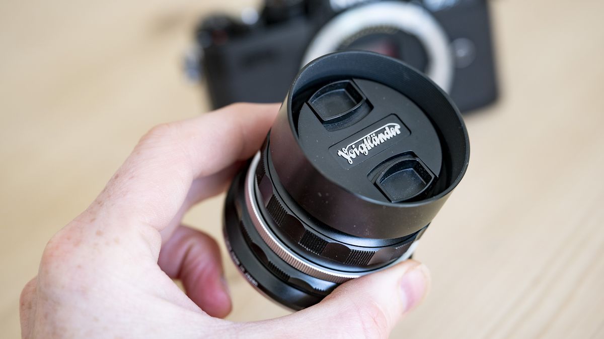 Voigtlander D 35mm f1.2 Nokton lens with lens hood and lens cap attached
