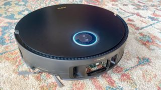 Mova Mobius 60 robot vacuum on carpet