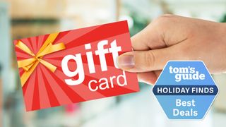 Woman's hand hold a generic gift card