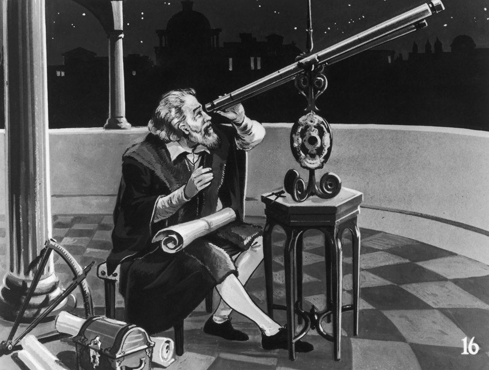 Galileo Galilei looks at the heavens through a telescope around 1620.